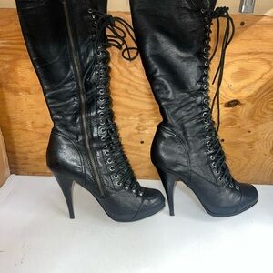 Sleek Black Lace-Up Heeled Boots